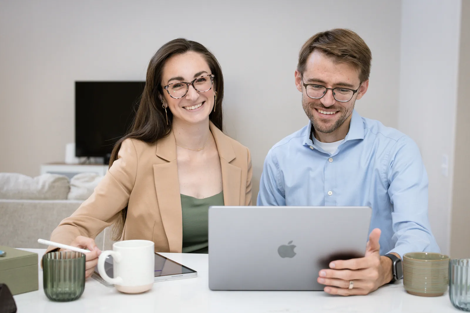 Ian and Brandie Atkinson-Baker reviewing numbers together